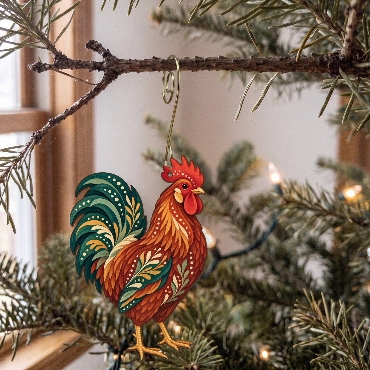 Laser-cut maple wood Rhode Island Red Rooster folk art ornament O499 hanging on a fir branch, made in USA