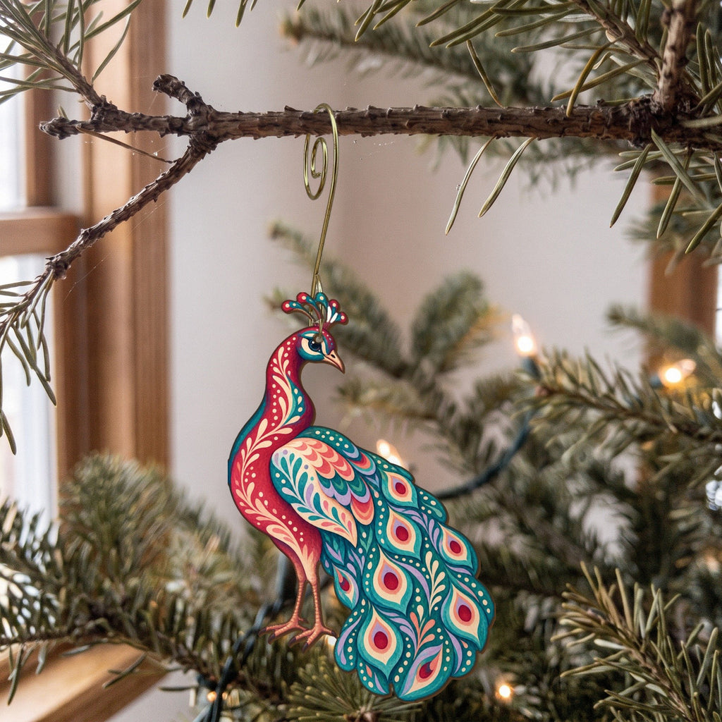 Laser-cut maple wood Indian Peafowl folk art ornament O504 hanging on a fir branch, made in USA