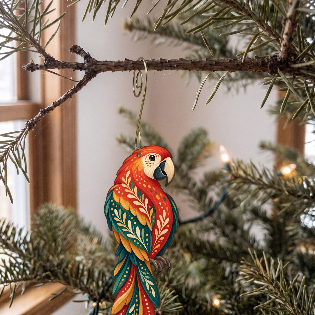 Laser-cut maple wood Scarlet Macaw folk art ornament O507 hanging on a fir branch, made in USA