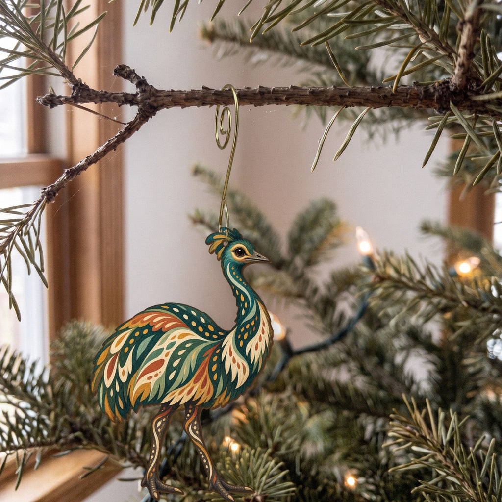 Laser-cut maple wood Emu folk art ornament O523 hanging on a fir branch, made in USA