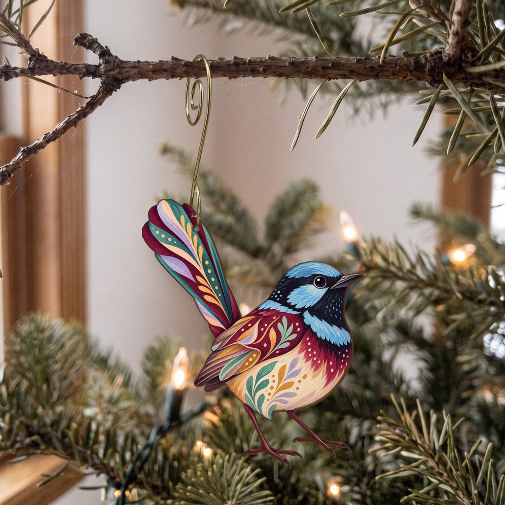 Laser-cut maple wood Superb Fairywren folk art ornament O526 hanging on a fir branch, made in USA