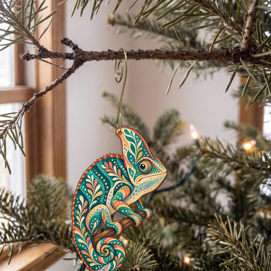 Laser-cut maple wood Veiled Chameleon folk art ornament O527 hanging on a fir branch, made in USA