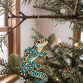 Laser-cut maple wood Leopard Gecko folk art ornament O529 hanging on a fir branch, made in USA