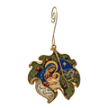 O671 — Fig Leaf of Wonder wooden Nativity ornament with gold spiral hook