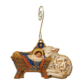 O874 — The Manger and the Lamb wooden Nativity ornament with gold spiral hook
