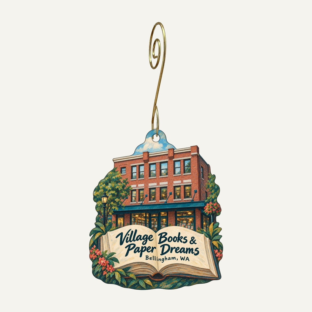 Village Books and Paper Dreams Logo custom wood ornament OC143 hanging on hook