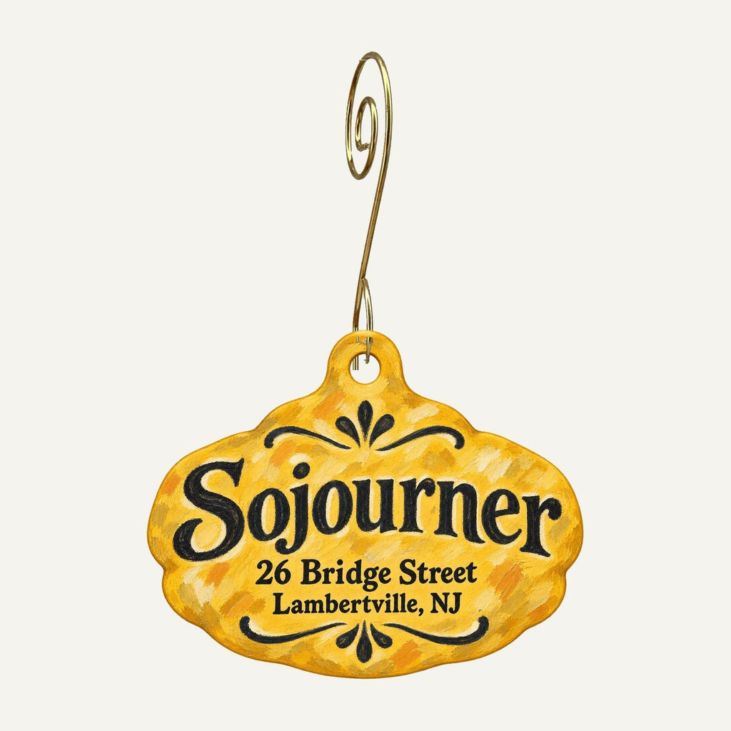 Sojourner Logo custom wood ornament OC623 hanging on hook