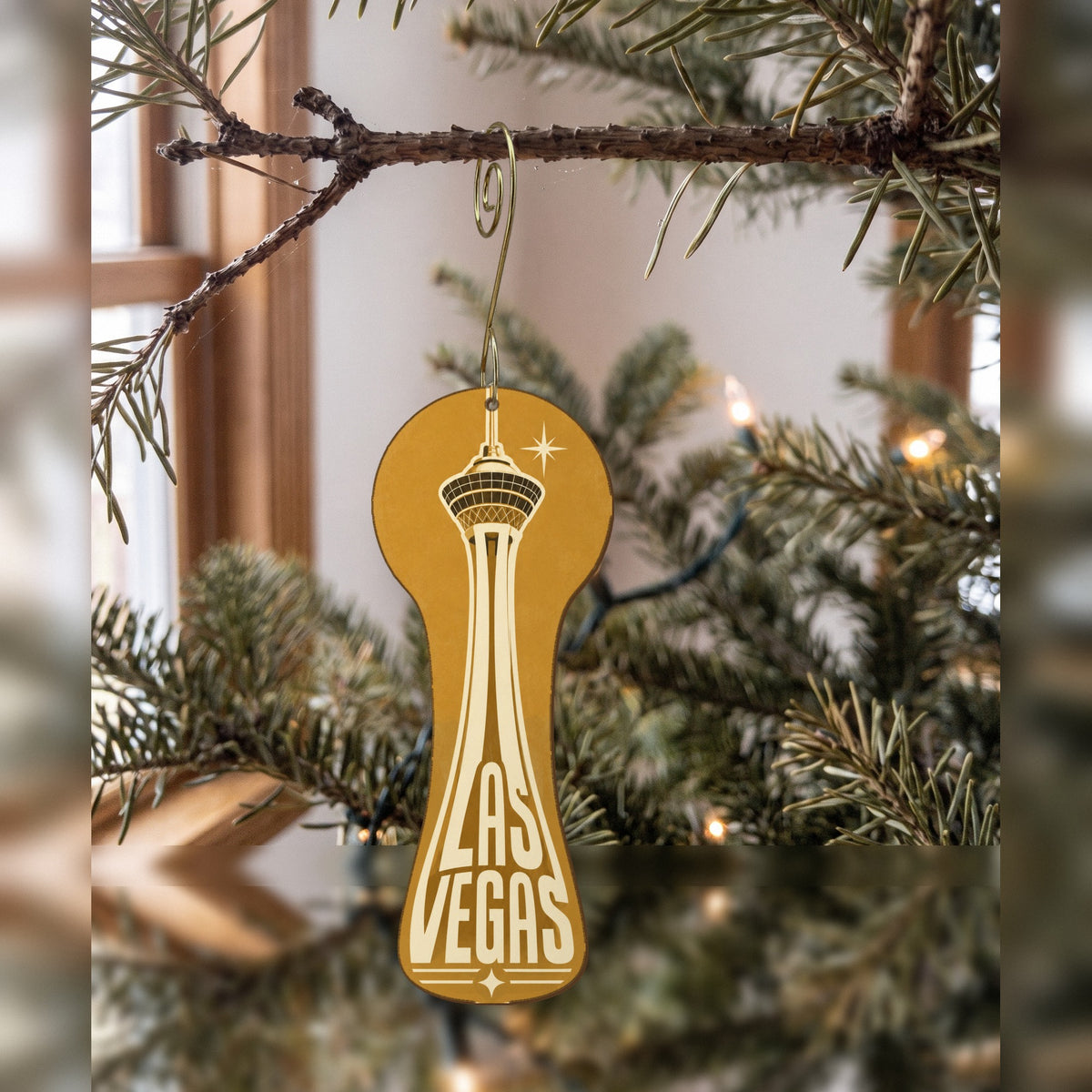 Las Vegas S315-O wooden ornament with its hanging hole supported in the solid round upper body.