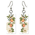 Peach Branch Bird — She's Choosing earrings, shown as a pair