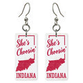 Red Outline — She's Choosing earrings, shown as a pair