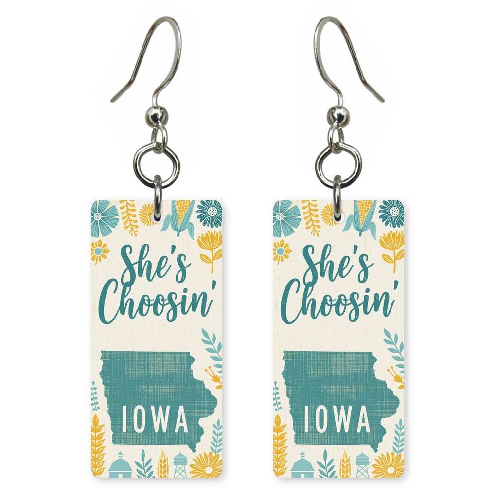 Blue Floral Silhouette — She's Choosing earrings, shown as a pair