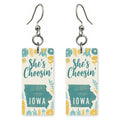 Blue Floral Silhouette — She's Choosing earrings, shown as a pair