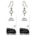 Ink Birds — She's Choosing earrings, shown as a pair