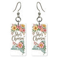 Rose Frame — She's Choosing earrings, shown as a pair