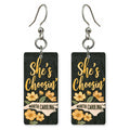 Golden Floral Black — She's Choosing earrings, shown as a pair