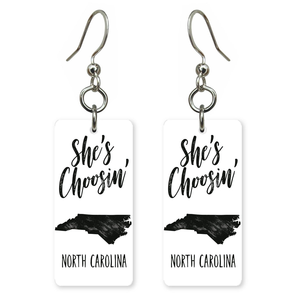 Ink Outline — She's Choosing earrings, shown as a pair