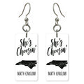 Ink Outline — She's Choosing earrings, shown as a pair