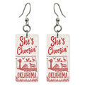 Red Wildlife — She's Choosing earrings, shown as a pair