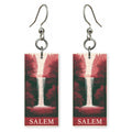 Silver Falls Text Salem — She's Choosing earrings, shown as a pair