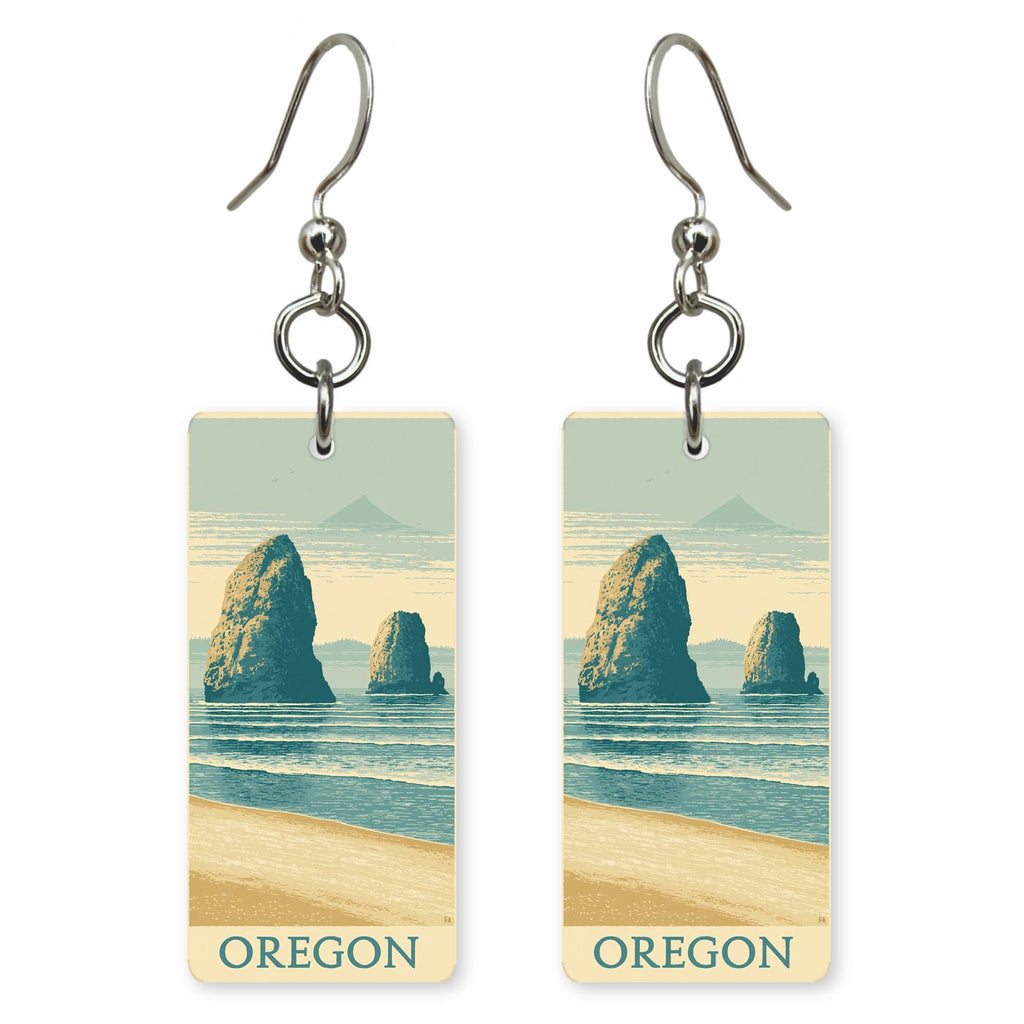 Haystack Rock Text Oregon — She's Choosing earrings, shown as a pair