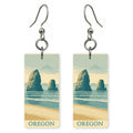 Haystack Rock Text Oregon — She's Choosing earrings, shown as a pair