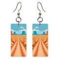 Monument Valley Dirt Road — She's Choosing earrings, shown as a pair