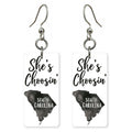 Ink Silhouette — She's Choosing earrings, shown as a pair