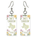 Script Logo — She's Choosing earrings, shown as a pair
