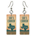 Script Logo — She's Choosing earrings, shown as a pair
