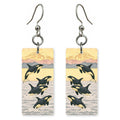 Orca Pod Breaching Golden — She's Choosing earrings, shown as a pair