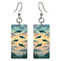 Orcas Swimming Through Sky — She's Choosing earrings, shown as a pair