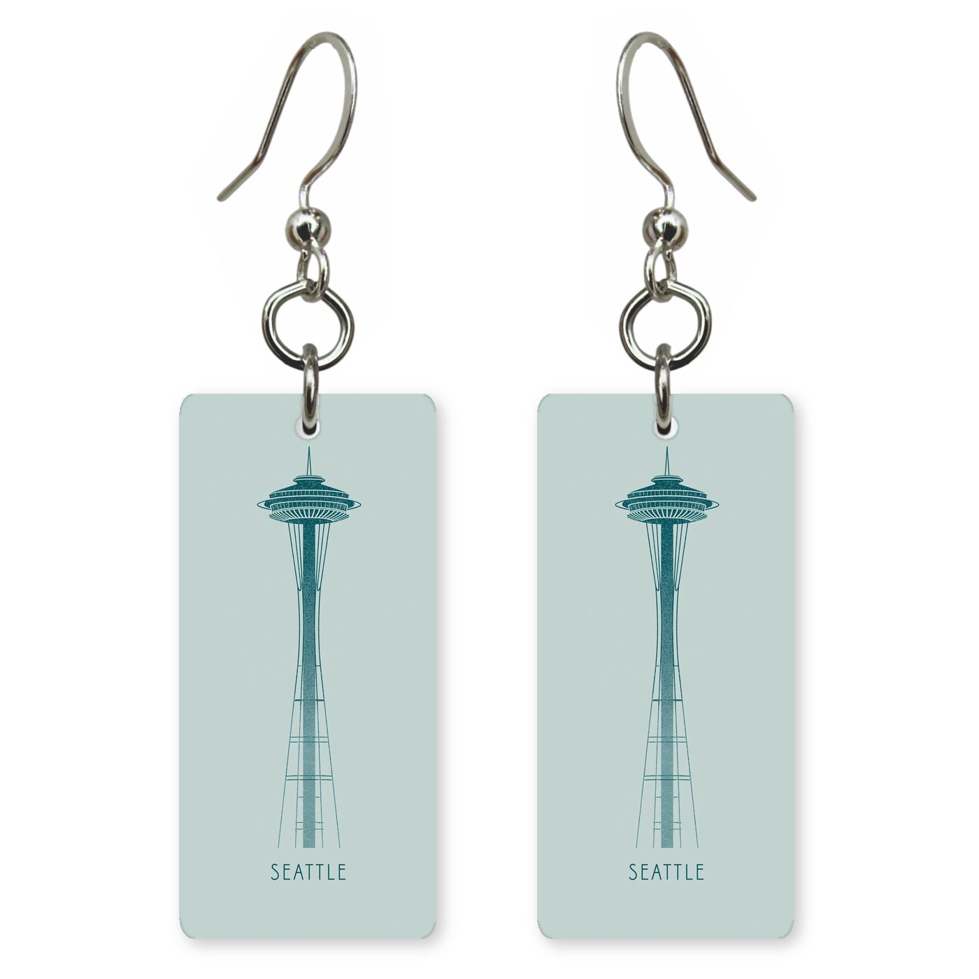 Space Needle Text Seattle — She's Choosing earrings, shown as a pair