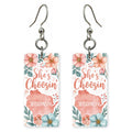 Pink Floral Silhouette — She's Choosing earrings, shown as a pair