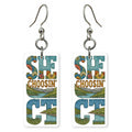 CT Photo Letters — She's Choosing earrings, shown as a pair