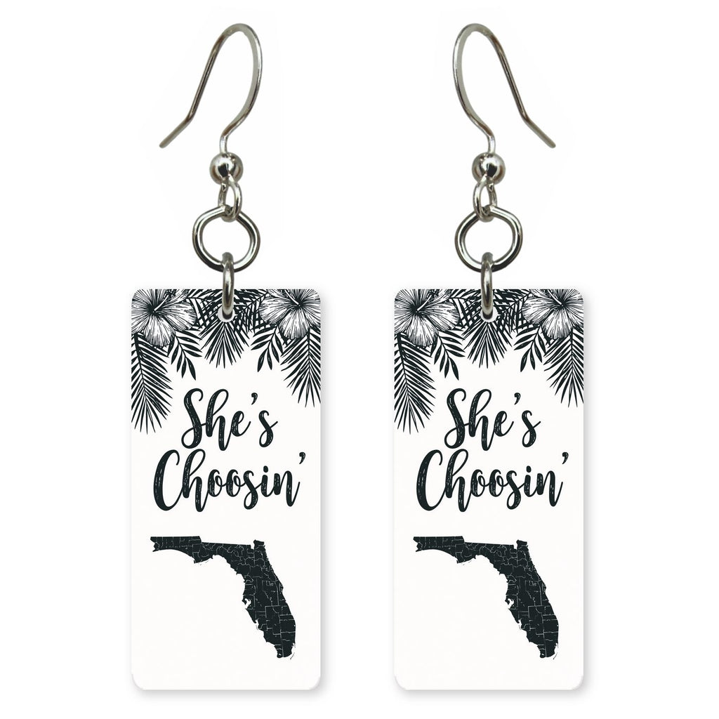 Black Palm Silhouette — She's Choosing earrings, shown as a pair