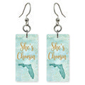 Teal Dot Silhouette — She's Choosing earrings, shown as a pair