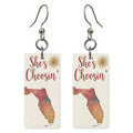 Red Sun Silhouette — She's Choosing earrings, shown as a pair