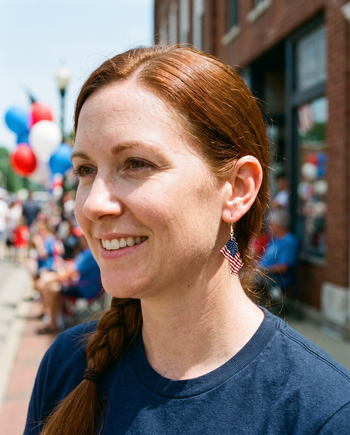 Waving American Flag Earrings #1578 shown on model